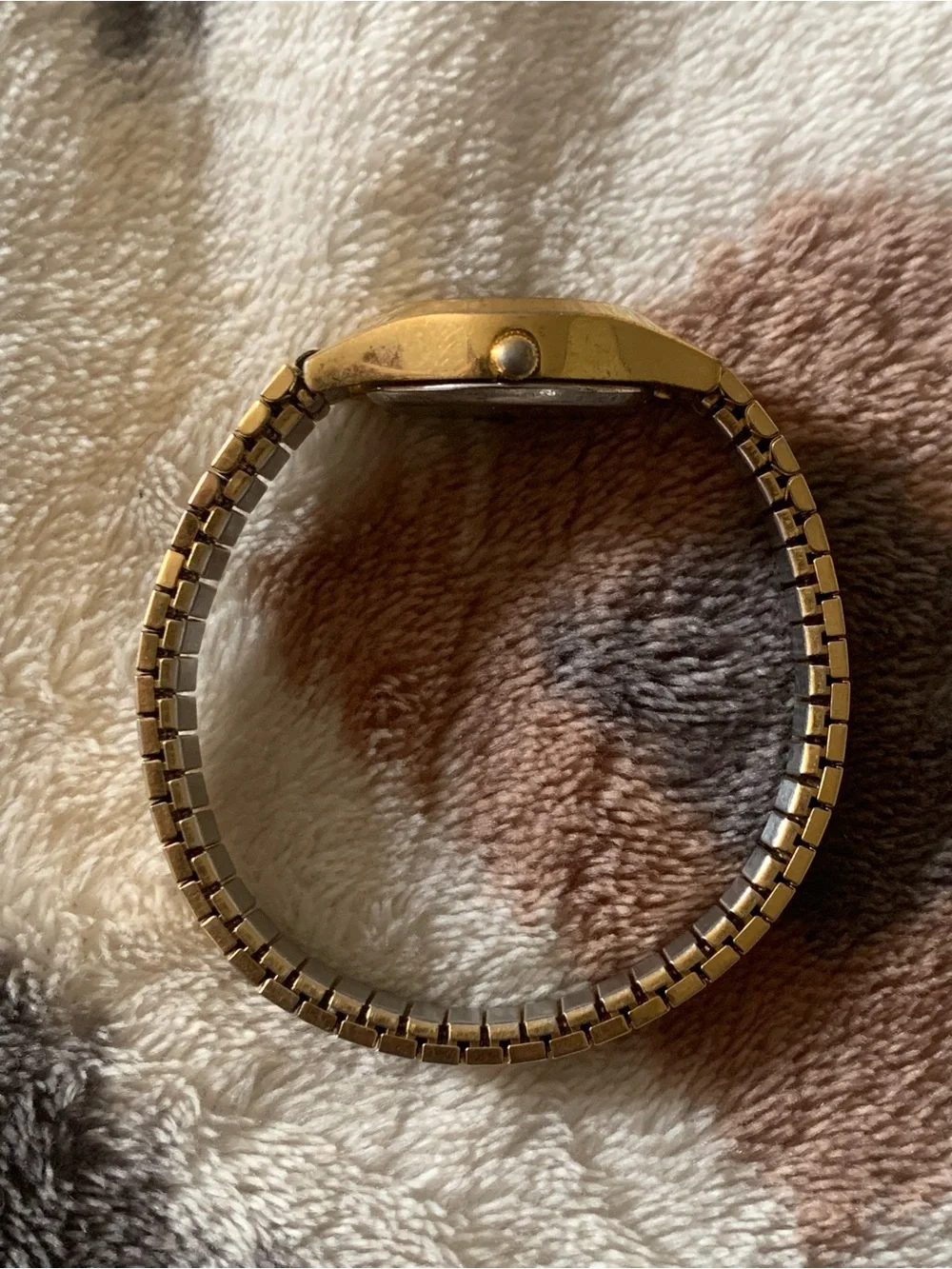 Armitron gold tone with black dial womens watch on stretch bracelet